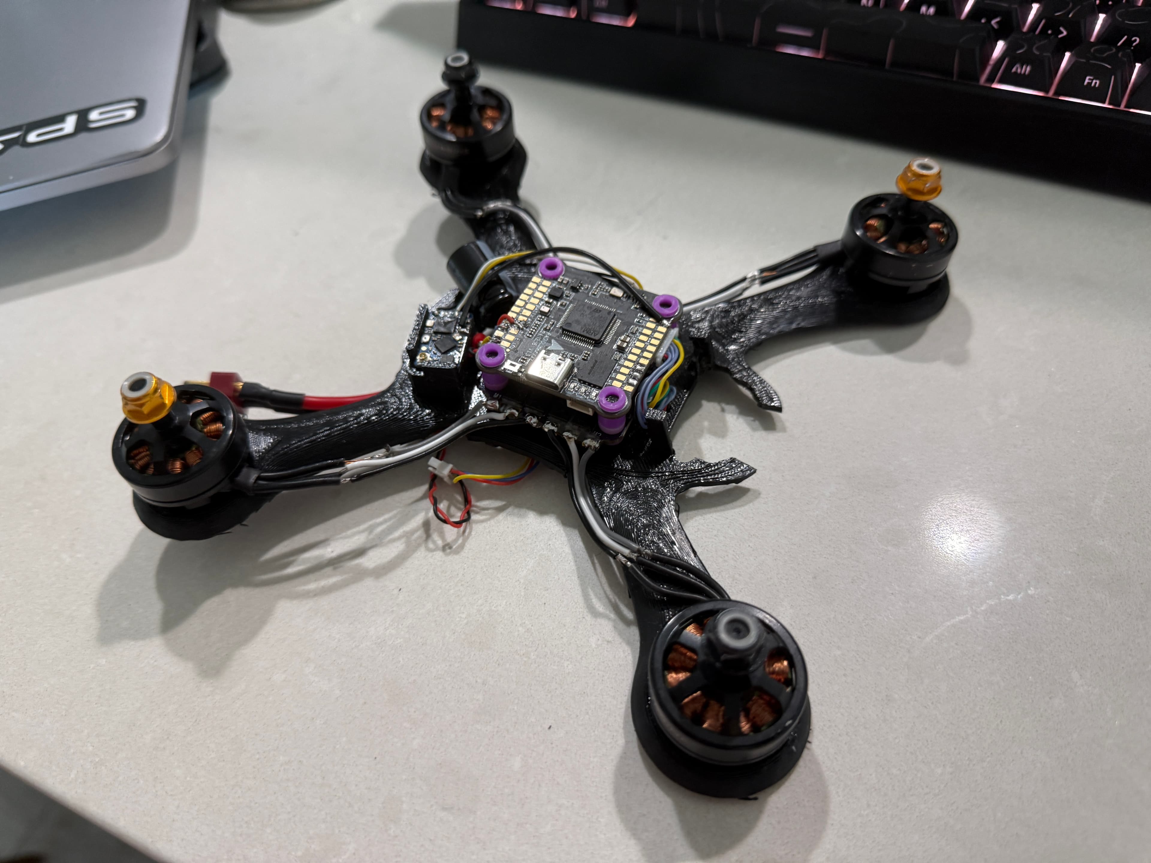 Flight controller stack mounted on the bare chassis